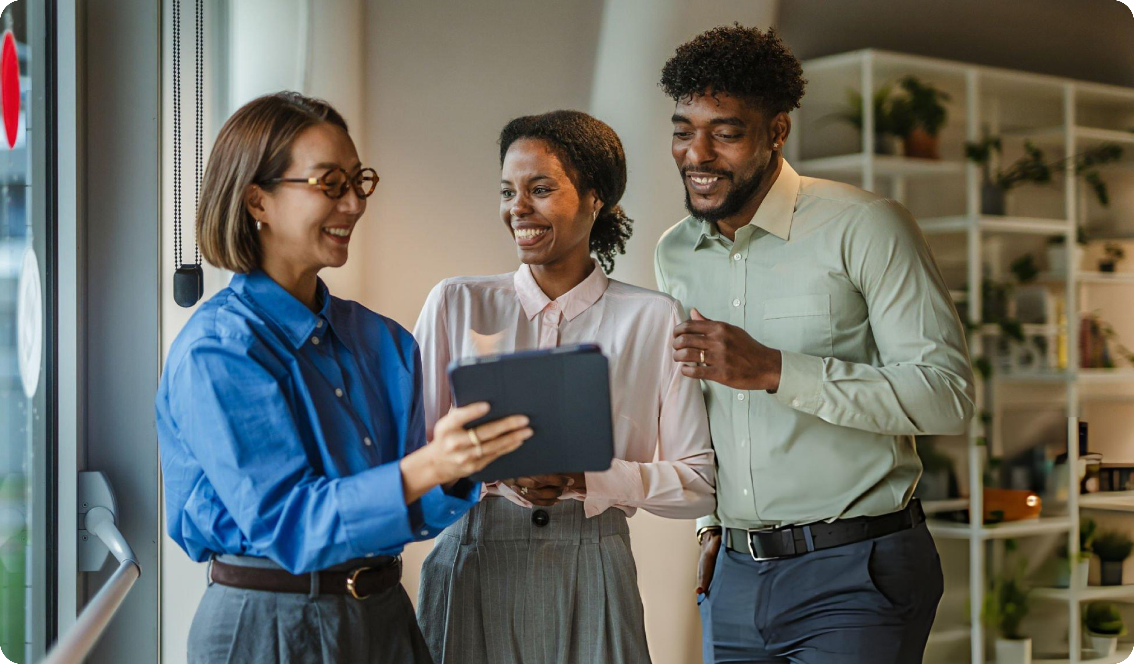 An agency team reviewing a client funnel together on a tablet